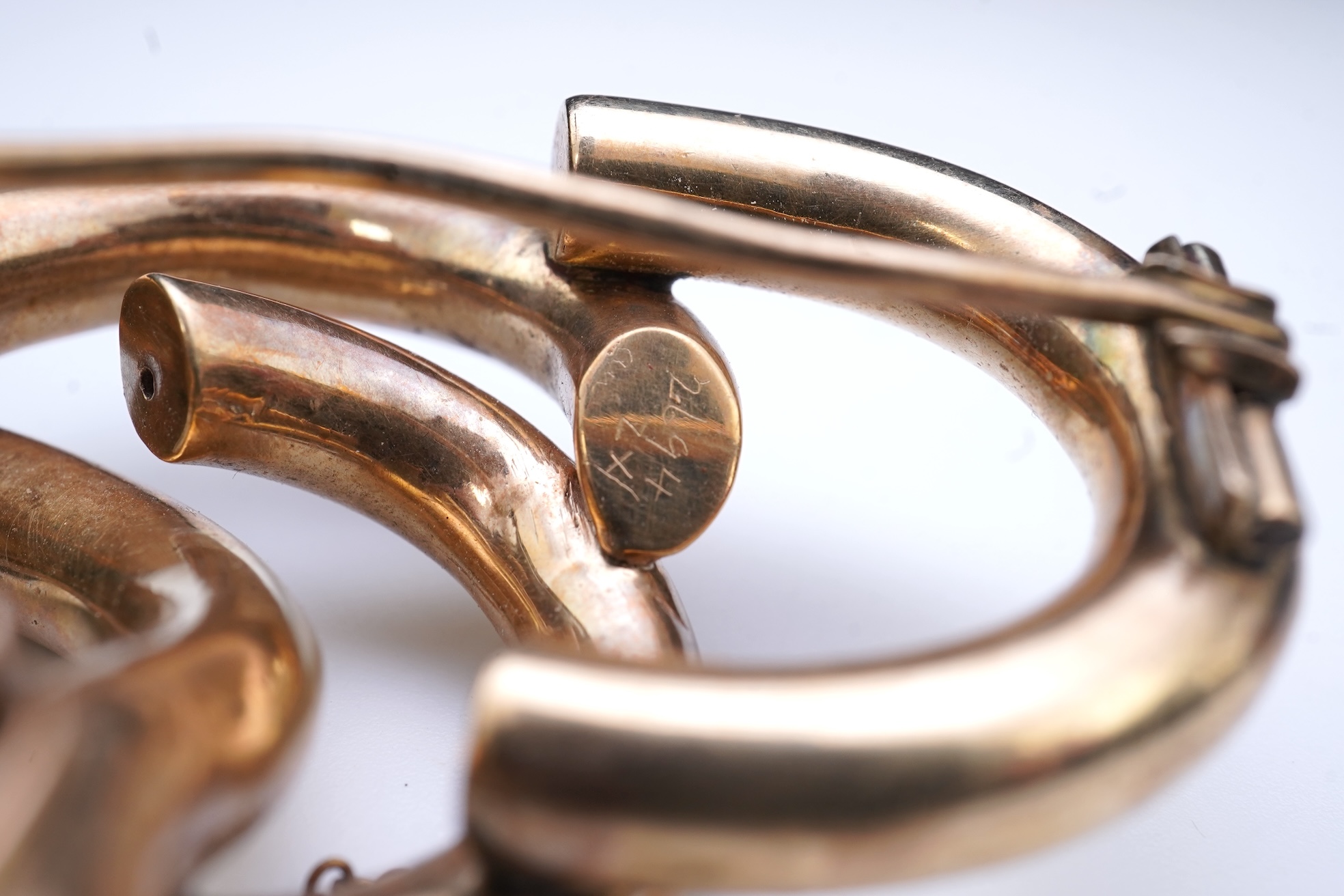 Four brooches and a gold signet ring